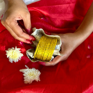 Kesariya | Yellow Raindrop Glass Bangles (Set of 12) | Kanchan October'24