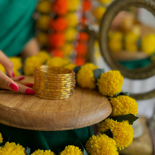 Amaltas | Golden Stone Studded Glass Bangles (Set of 12) | Kanchan 2024