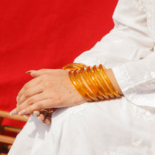 Load image into Gallery viewer, Swarnima | Yellow Glass Bangle Pair with Crystal Cuts | Kanchan ~ Bangles of Glass
