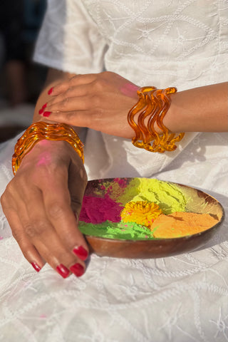 Genda Phool | Yellow Chandralekha Twisted Glass Colored Bangles