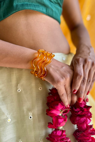 Genda Phool | Yellow Chandralekha Twisted Glass Colored Bangles