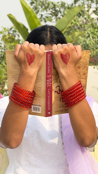 Narangi Jalebi Bangles | Orange Twisty Glass Bangle Pair