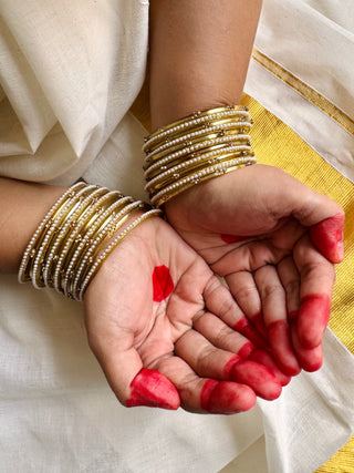 Amaltas aur Moti Stack | Golden Stone Studded Bangles & Moti Bangles